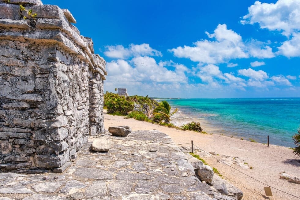 Maya ruins beside the coast featured in Resort Concierge Escapes Cancun travel content.